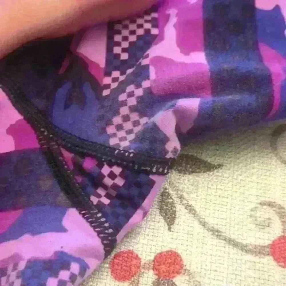 Nike Dri-Fit Purple/Black Patterned Cropped Leggings
